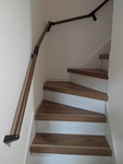 階段　階段は作り替えせず、既存の階段の上から施工するタイプのリフォーム部材で化粧しました。